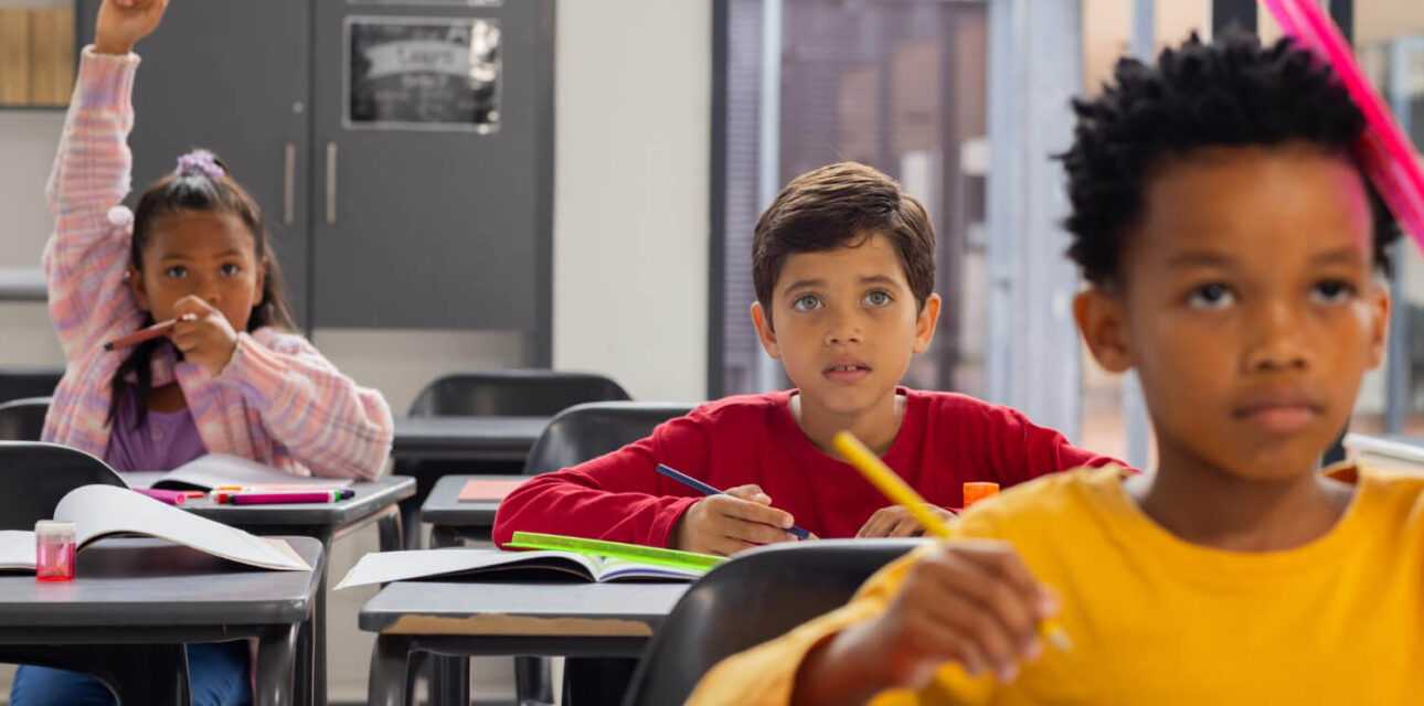 Students sitting at desks during a classroom lesson in Colorado.