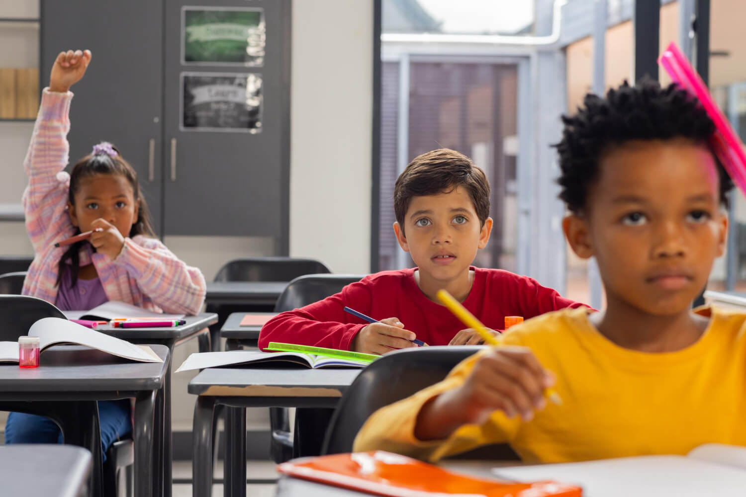 Students sitting at desks during a classroom lesson in Colorado.