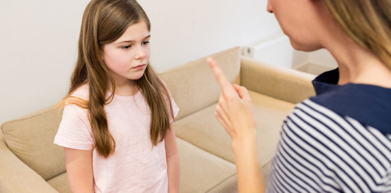 Parent setting a boundary with her autistic daughter.