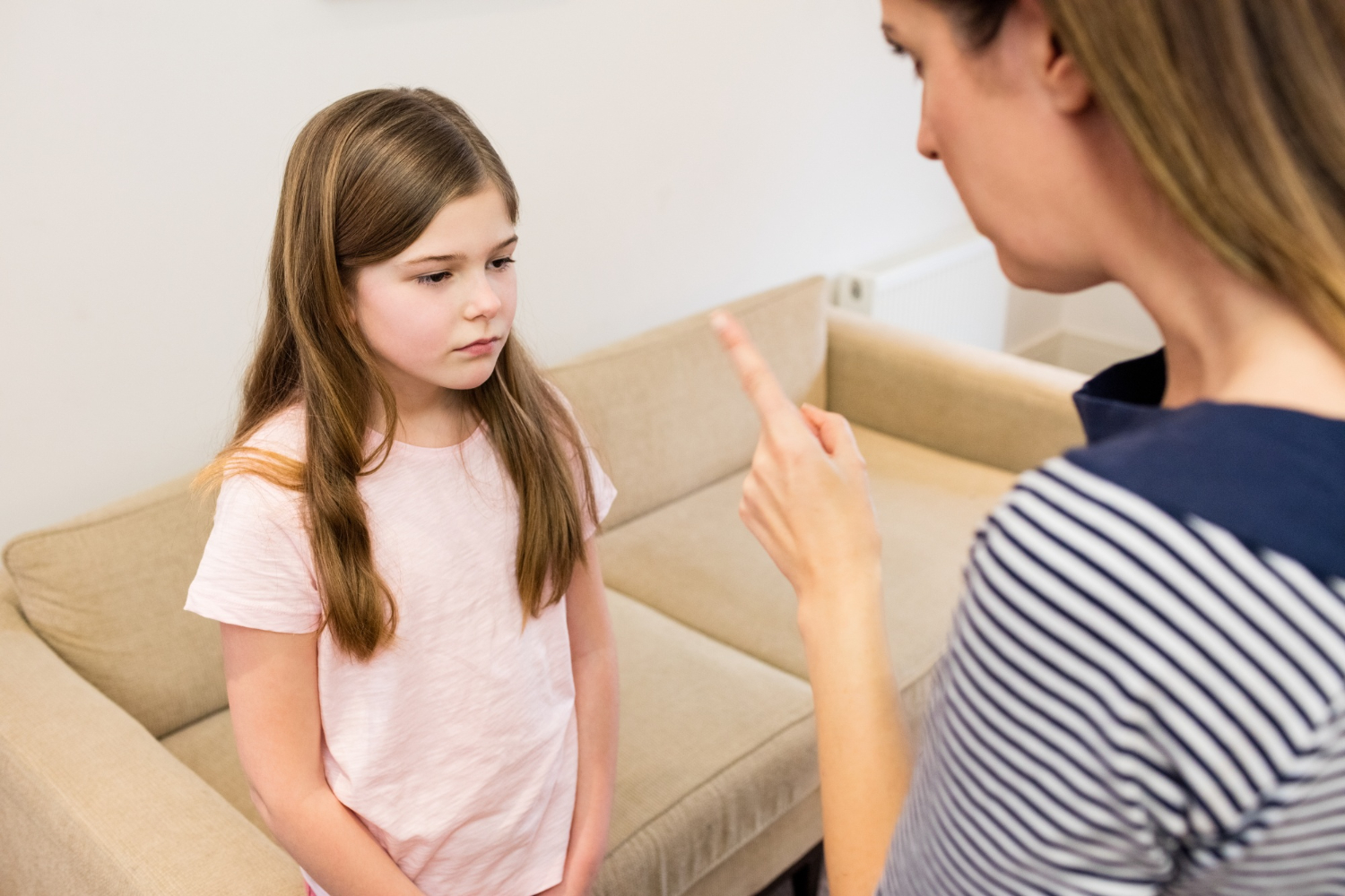 Parent setting a boundary with her autistic daughter.